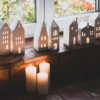 photophore en porcelaine blanche en forme de maison